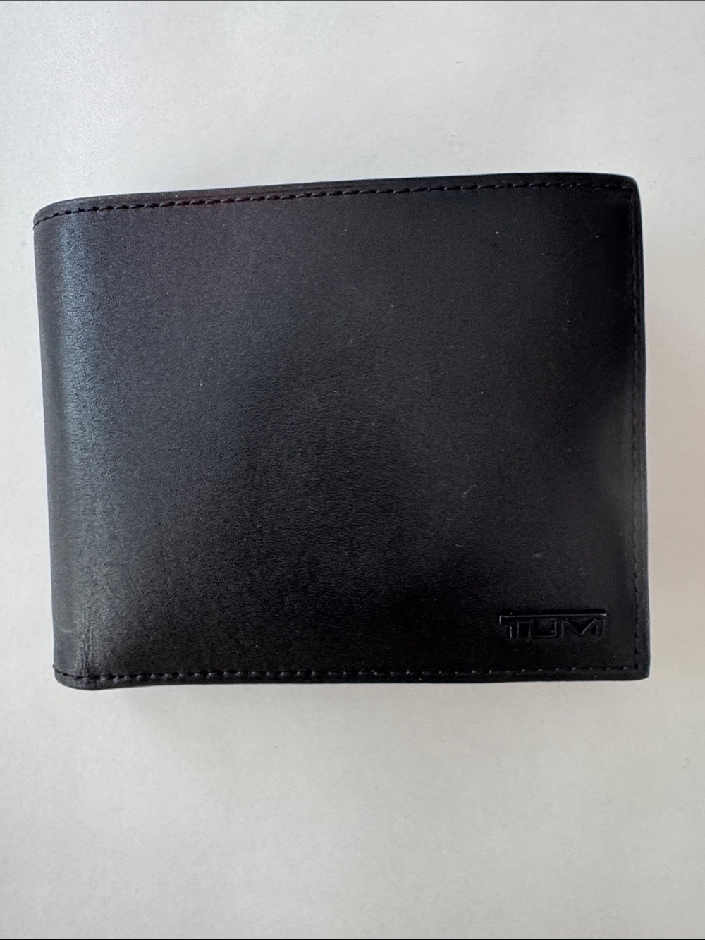 TUMI Black Leather Bifold Wallet ID Window Red Lining